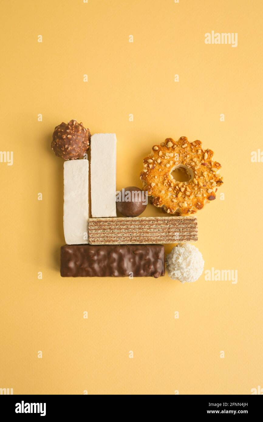 Composition artistique en aliments sucrés. Concept de conception alimentaire. Banque D'Images
