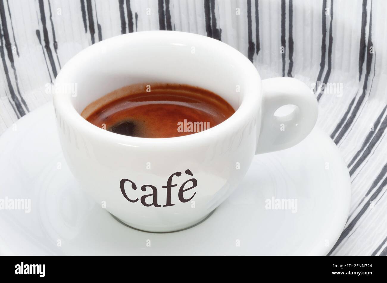 Tasse de café expresso avec logo français et espagnol Banque D'Images
