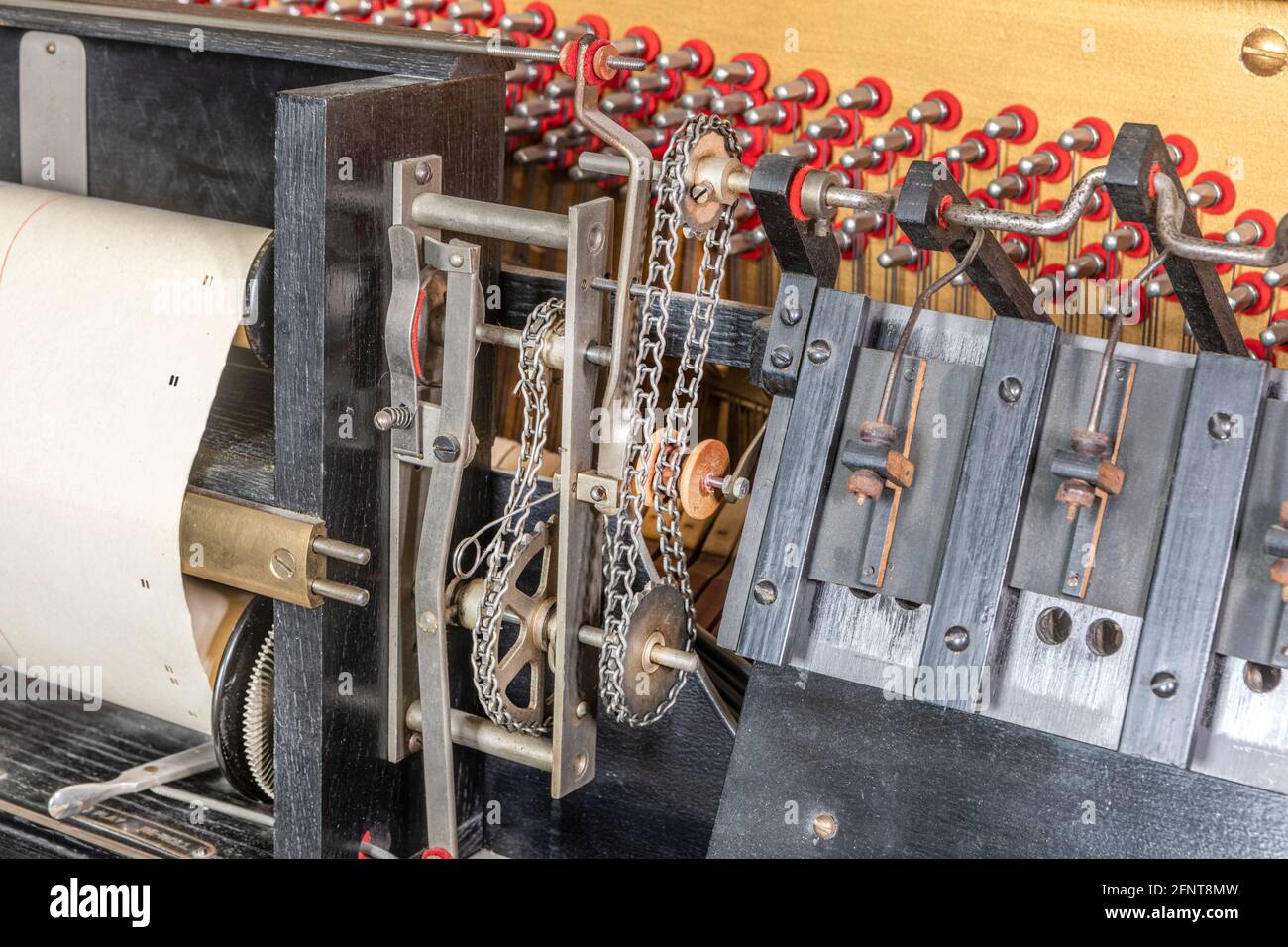 Les chaînes d'entraînement de Pianola Banque D'Images