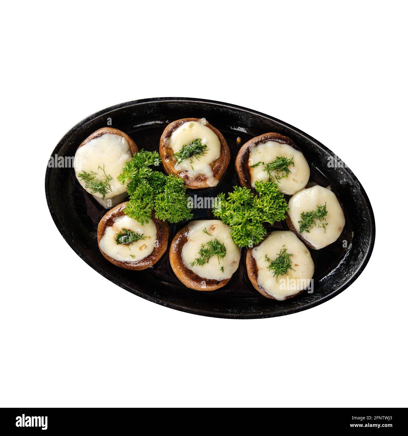 Assiette isolée de champignons cuits au fromage Banque D'Images