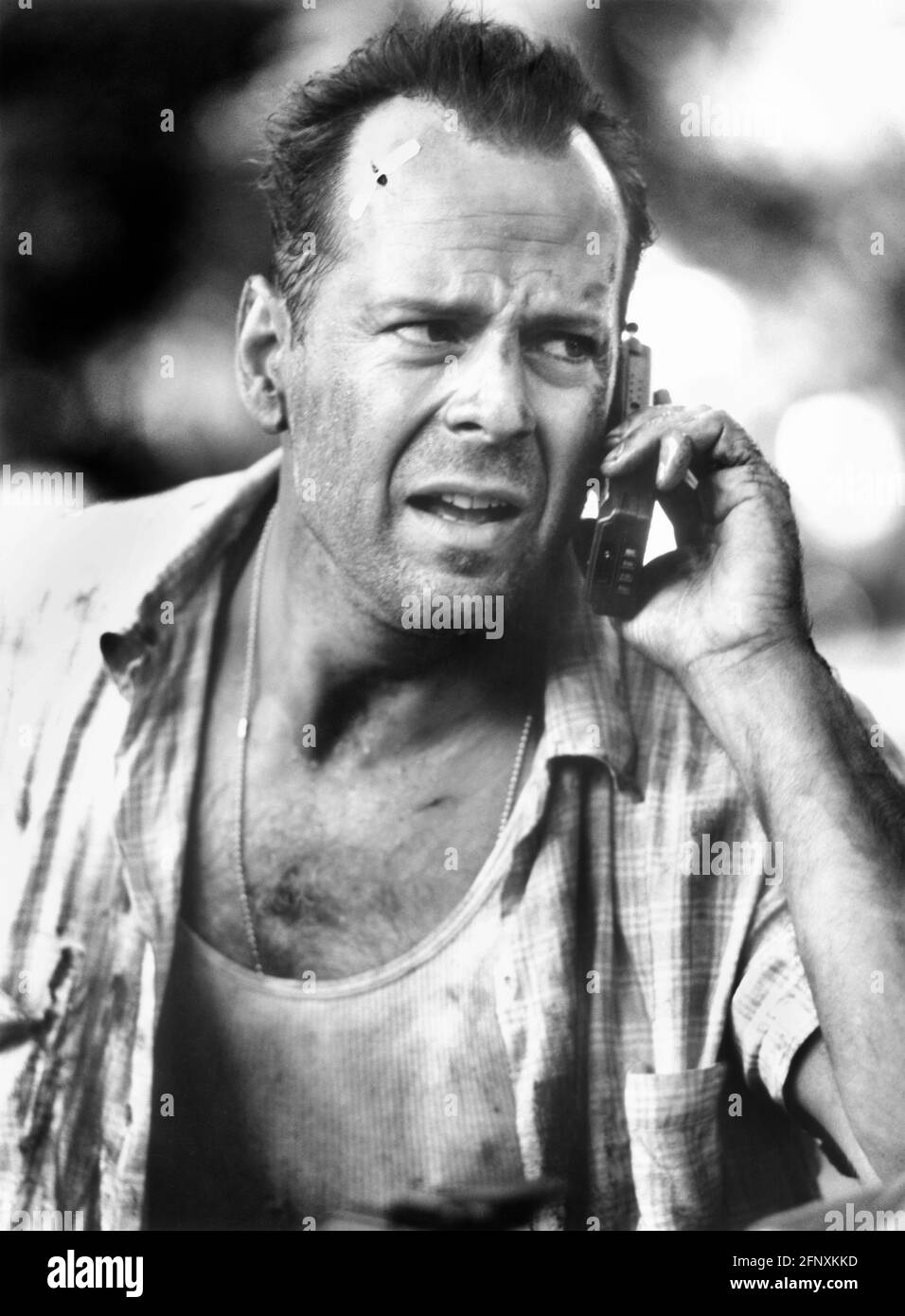 Bruce Willis, Portrait de la tête et des épaules sur le tournage du film, 'Die Hard with a Vengeance', 20th Century-Fox, 1995 Banque D'Images