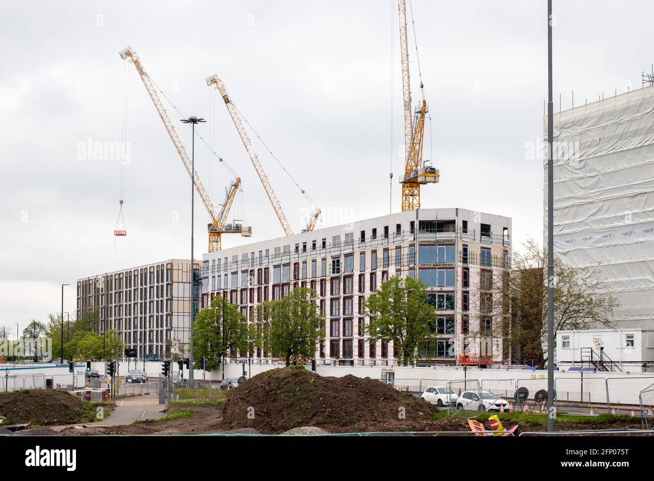 Des logements controversés sont en cours de construction à Perry Barr, Birmingham. Initialement destiné à être prêt comme le village des athlètes pour les Jeux du Commonwealth 2022, le projet est tombé en retard en raison de Covid et va maintenant devenir de nouvelles maisons. Banque D'Images