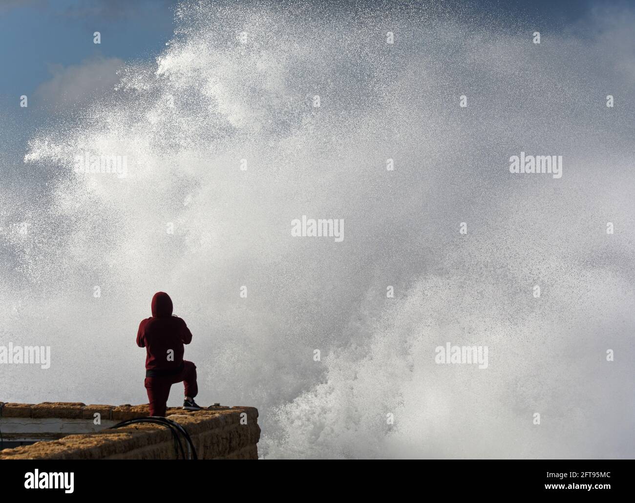 Photographe Smashing Wave Banque D'Images