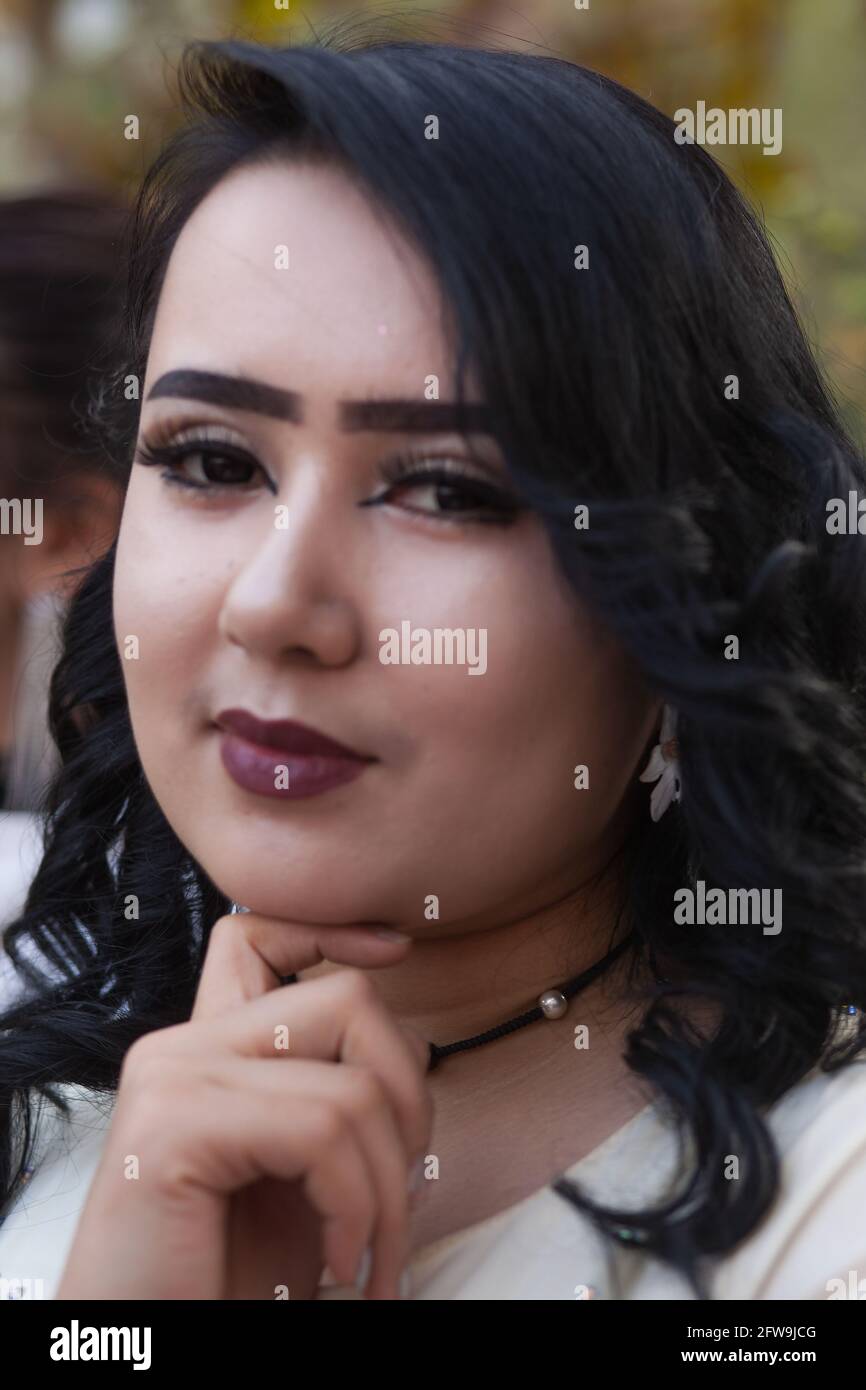 Uyghur jeune homme au marché du dimanche Kashgar, Xinkiang, République populaire de Chine, 2019 Banque D'Images