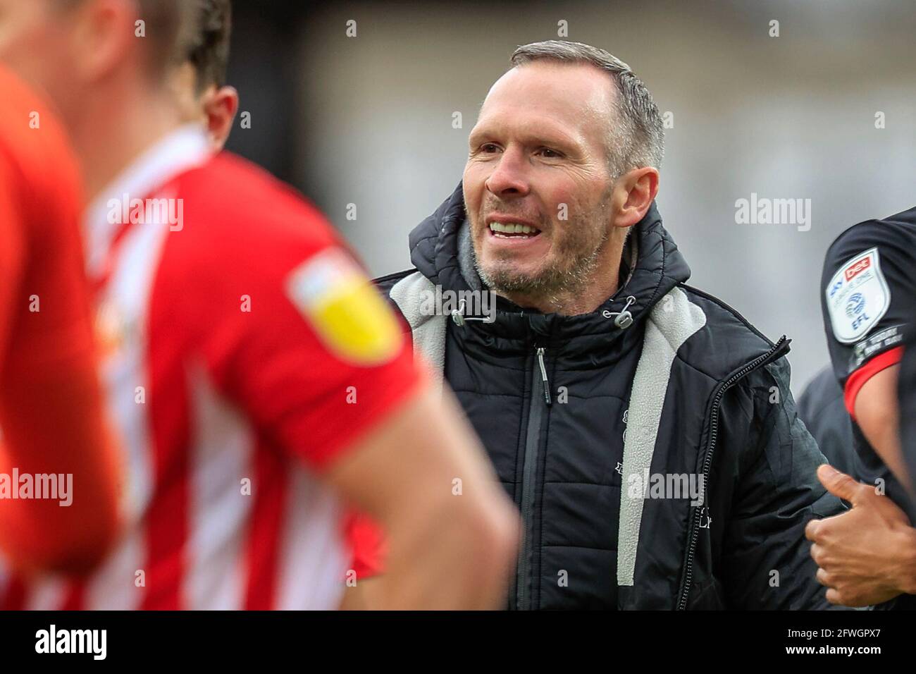 Le directeur de Lincoln City, Michael Appleton, sourit après avoir vu son côté atteindre la finale de la Ligue un au stade Wembley Banque D'Images