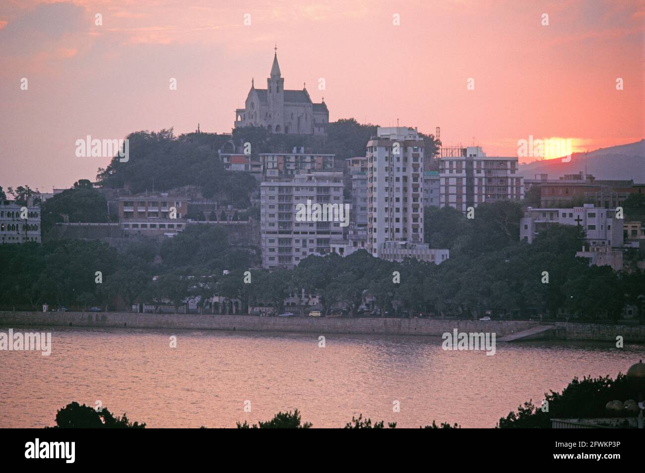 Chine. Macao. Ville au coucher du soleil. Banque D'Images