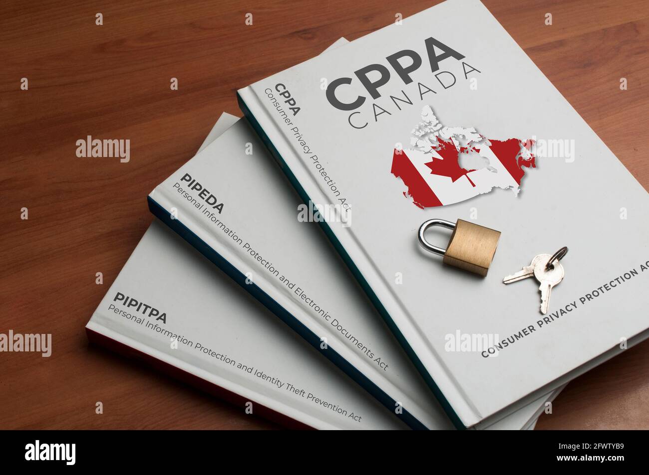 Nouveau concept de loi canadienne sur la protection des données (lcpp) : trois livres indiquent le nom de l'ancienne et de la nouvelle loi canadienne sur la protection des données Banque D'Images