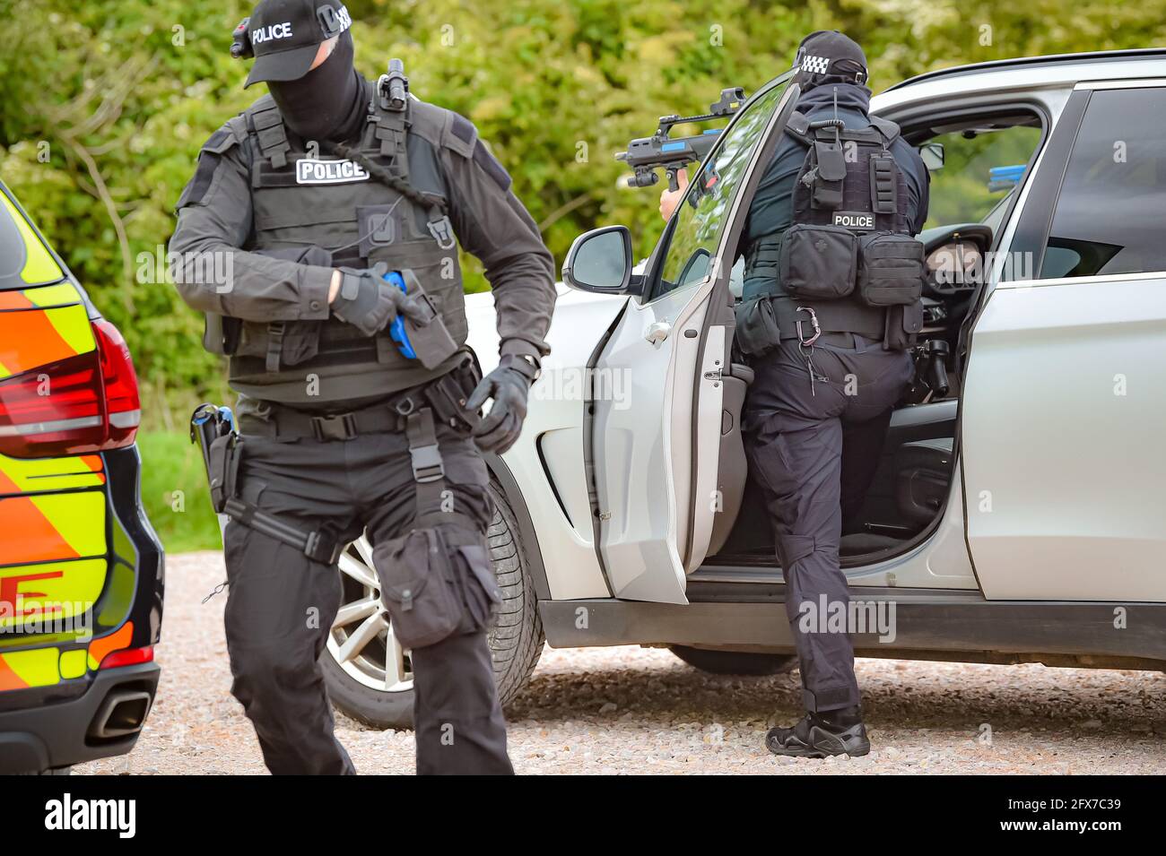 Les membres de l'équipe des armes à feu de Devon et de la police de Cornwall suivent un scénario d'arrêt de véhicule armé au quartier général de la force à Exeter, alors qu'ils se préparent au prochain Sommet du G7 à Cornwall. Date de la photo: Mardi 25 mai 2021. Banque D'Images