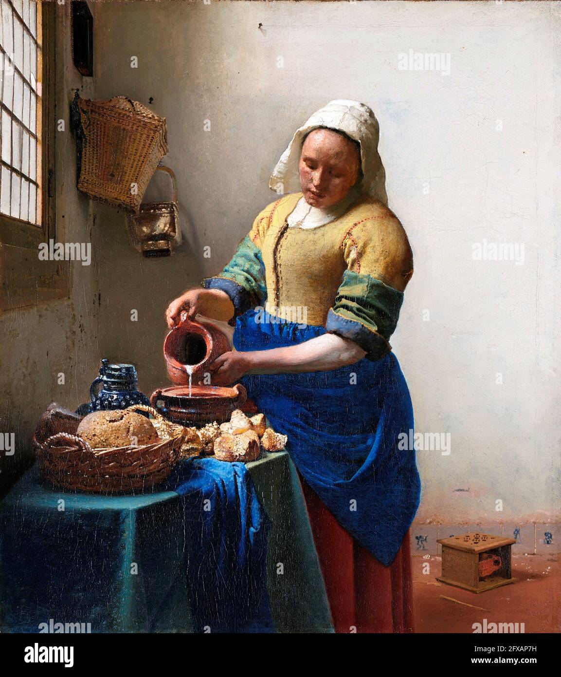 Vermeer. 'La Milkmaid' par Johannes Vermeer (1632-1675), huile sur toile, c. 1660 Banque D'Images