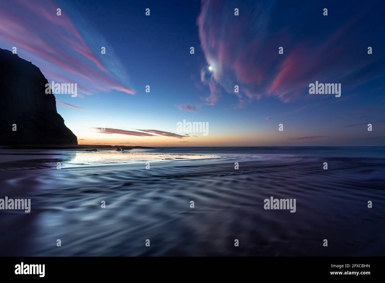 Nouvelle-Zélande, île du Sud, océan au coucher du soleil Banque D'Images