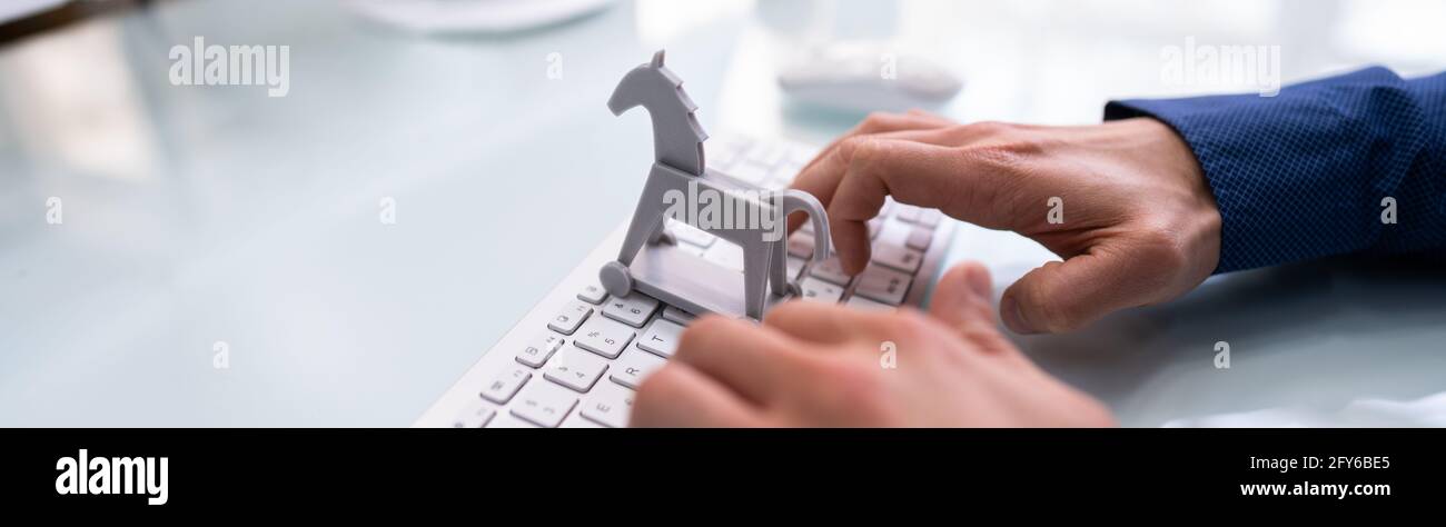 Attaque de crime de virus d'ordinateur de cheval de Troie. Cyber-technologie Banque D'Images