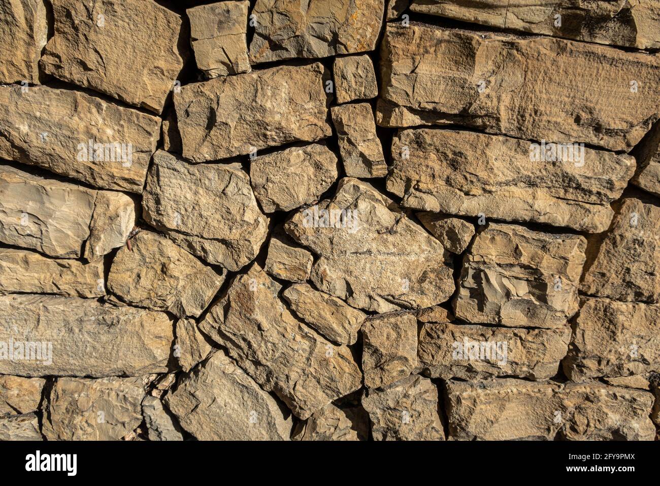 Arrière-plan mural rustique en pierre marron Banque D'Images