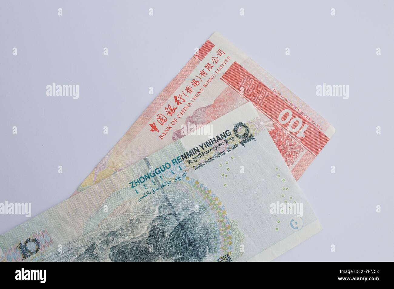 Cent dollar de Hong Kong sur le côté de dix billets de Yuan chinois Banque D'Images