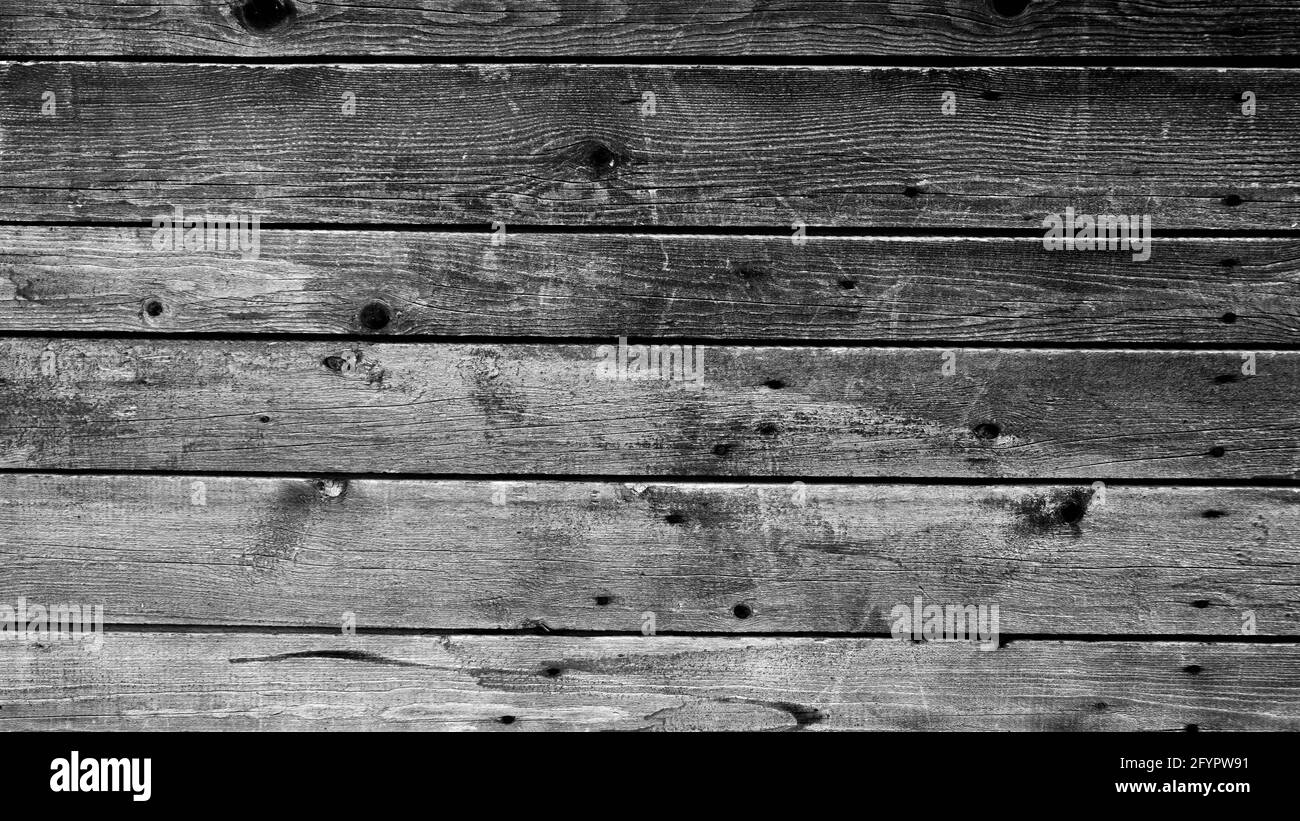 Arrière-plan des anciens tableaux en noir et blanc. Texture des planches de bois. Banque D'Images