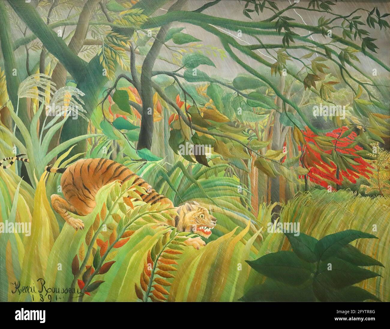 Tigre dans une tempête tropicale (surpris!) Par le peintre impressionniste français Henri Rousseau à la National Gallery, Londres, Royaume-Uni Banque D'Images