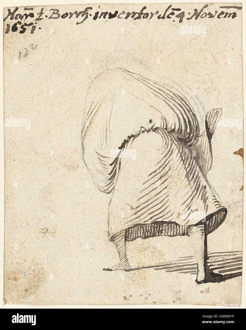 Femme avec jupe au-dessus de sa tête, de derrière. Banque D'Images
