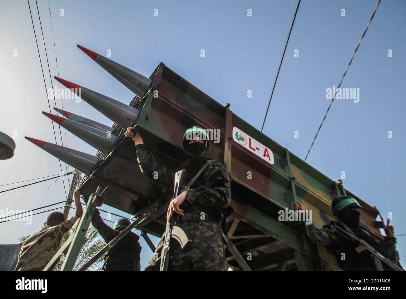 Des membres des Brigades Martyr Izz al-DIN al-Qassam participent à un défilé militaire à Beit Lahia, dans le nord de la bande de Gaza, dans les Territoires palestiniens, le 30 mai 2021. Photo de Ramez Habboub/ABACAPRESS.COM Banque D'Images