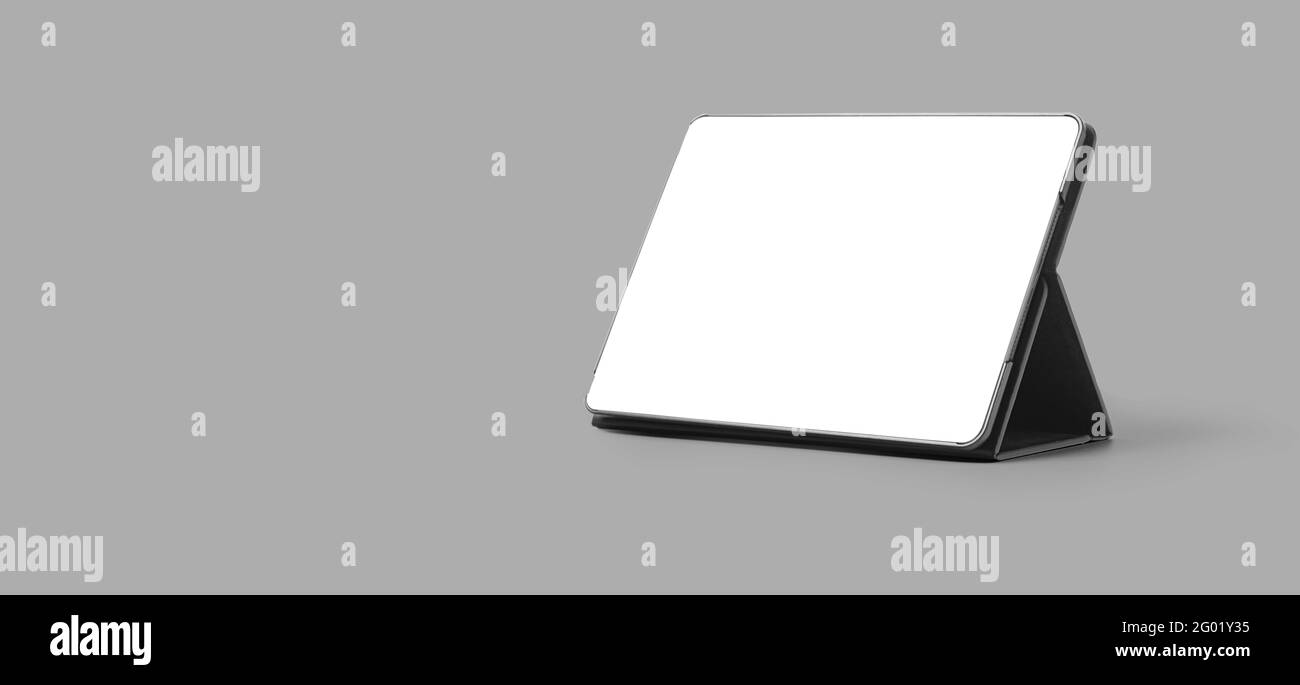 tablette sur le support isolée sur fond gris avec écrêtage chemin Banque D'Images