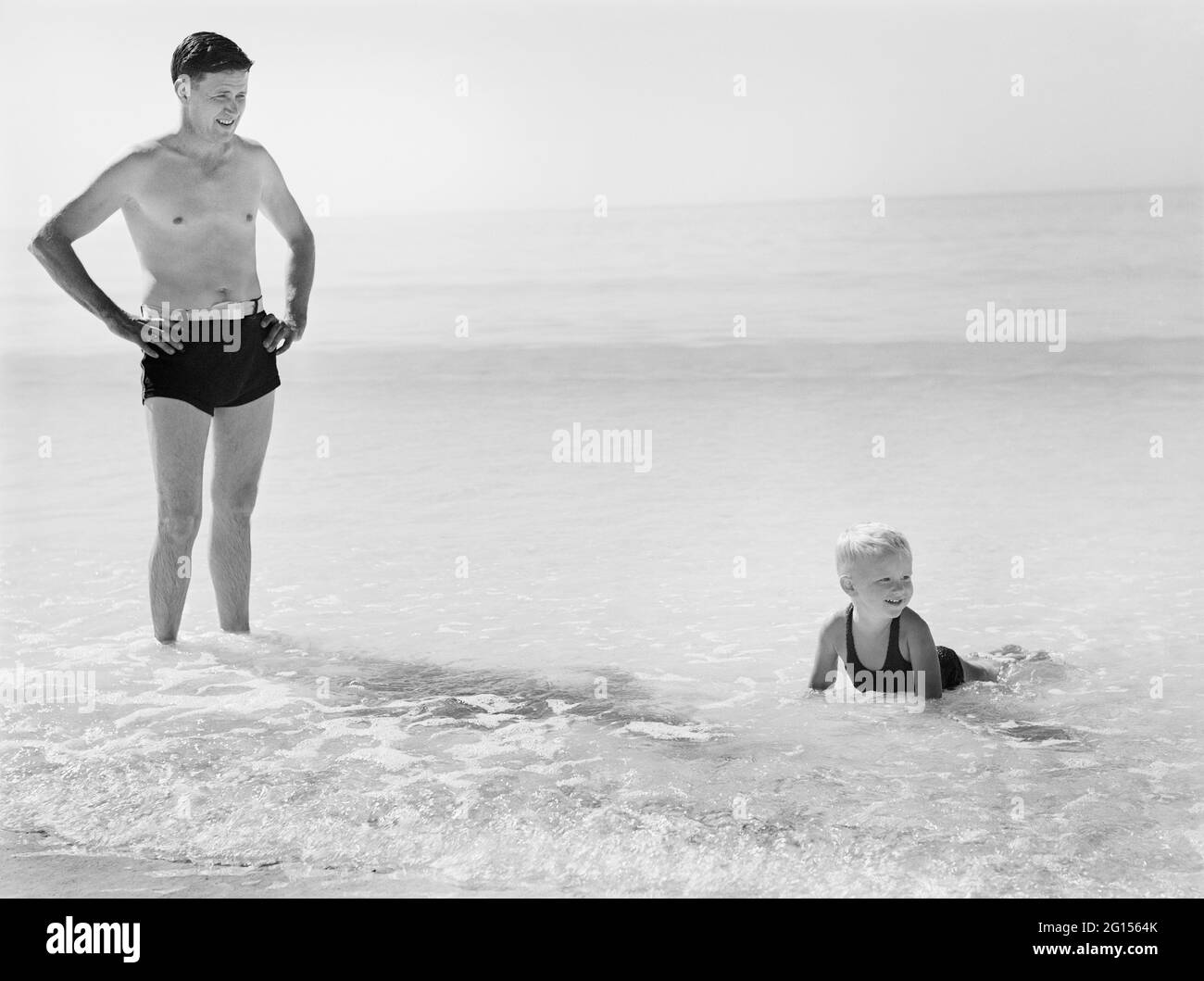 Père et jeune fils à Beach, Sarasota, Floride, États-Unis, Marion Post Wolcott, Administration américaine de la sécurité agricole, janvier 1941 Banque D'Images