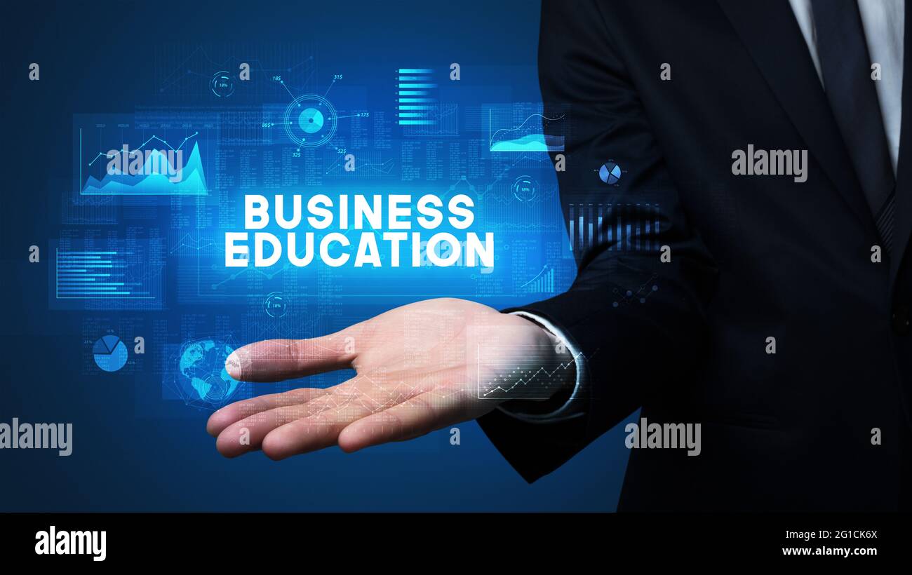 Main d'homme d'affaires tenant le message de motivation Banque D'Images