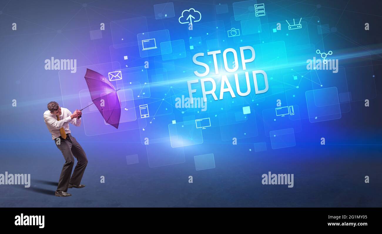 se défendre avec un parapluie contre les cyber-attaques Banque D'Images
