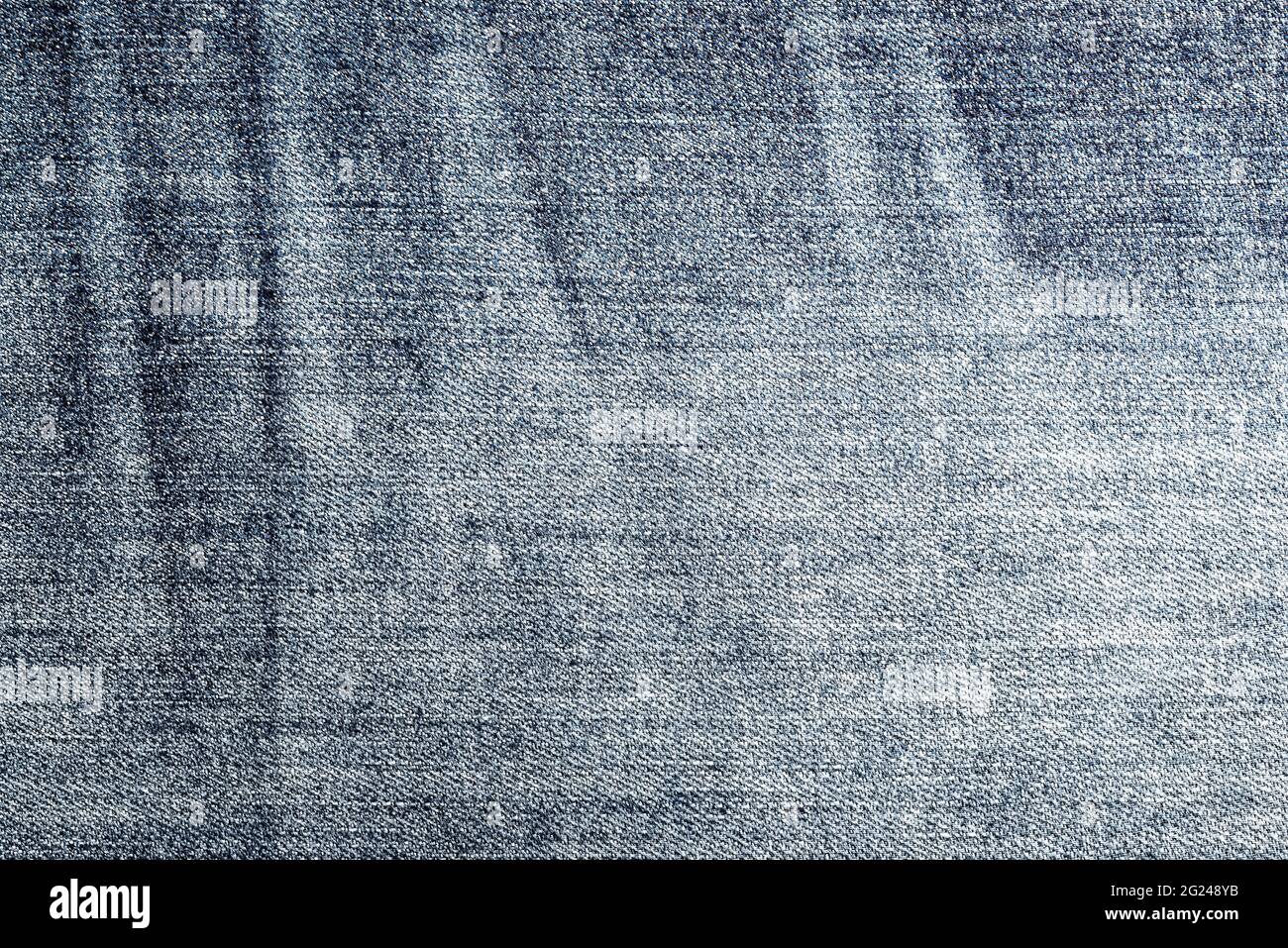 vue rapprochée du tissu denim bleu usé, fond plein cadre Banque D'Images