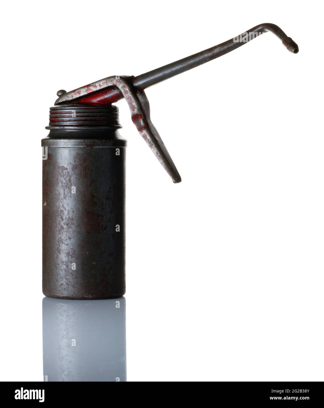 Une vieille burette d'huile avec gâchette pour l'éjection de l'huile du bec long. Banque D'Images