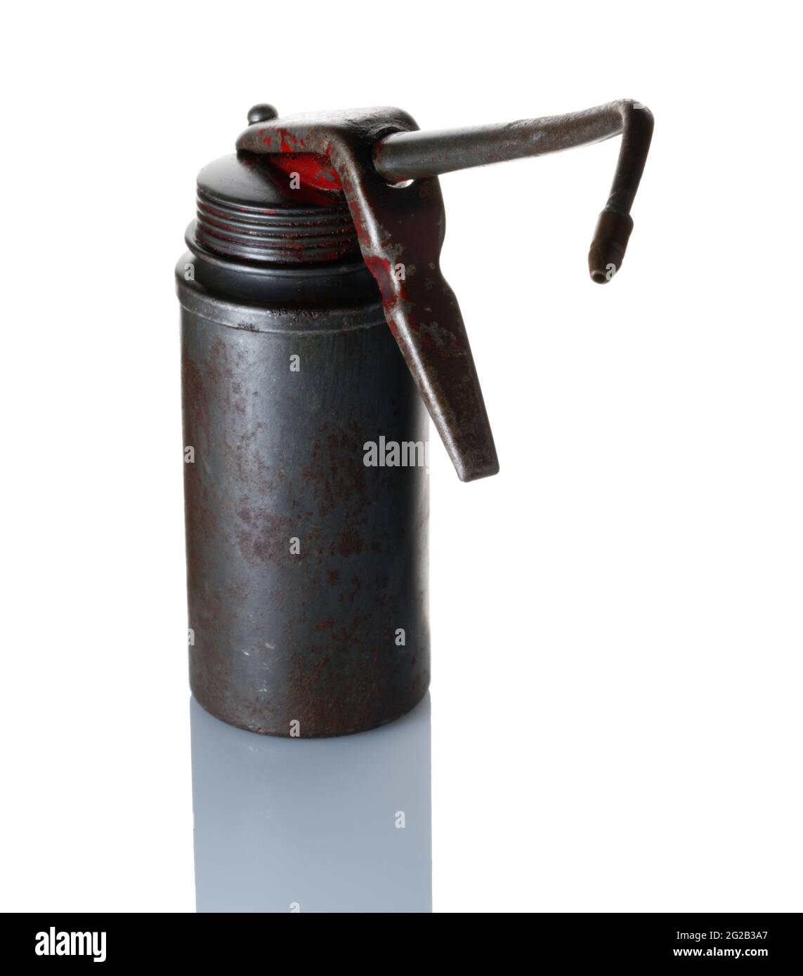 Une vieille burette d'huile avec gâchette pour l'éjection de l'huile du bec long. Banque D'Images