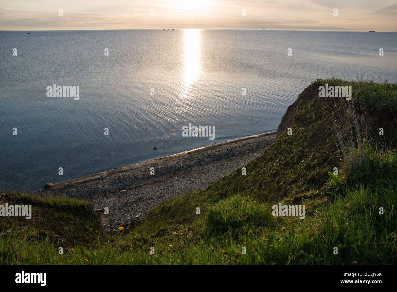 Lever du soleil sur la côte escarpée de Stohl, Dänischenhagen, Kiel, mer Baltique Banque D'Images
