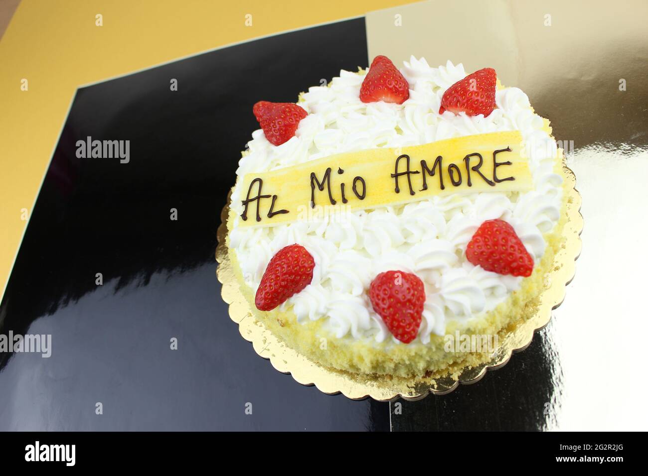 Gâteau aux fraises Amour écrit en italien 'Al Mio Amore' Banque D'Images