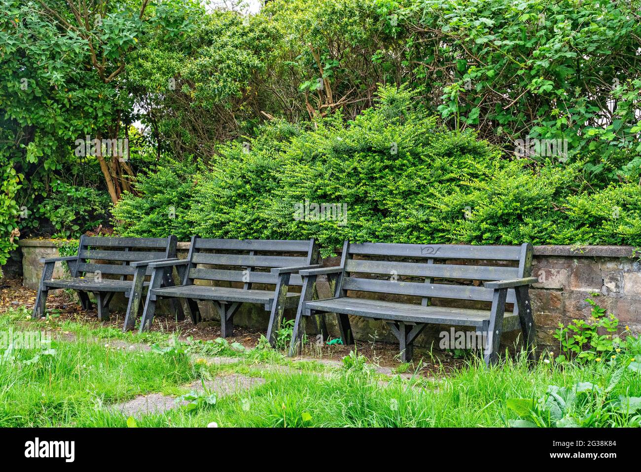 Trois banquettes en bois de suite Banque D'Images