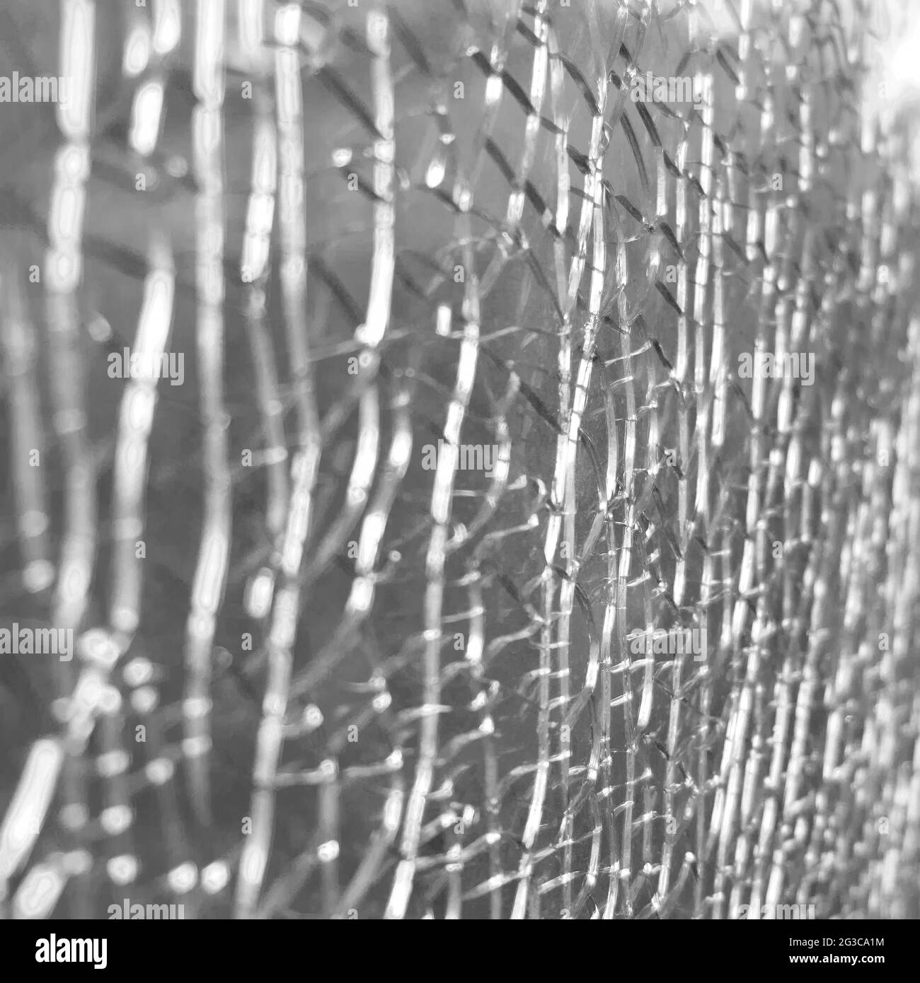 Fond de fissures sur verre incolore cassé, texture Banque D'Images