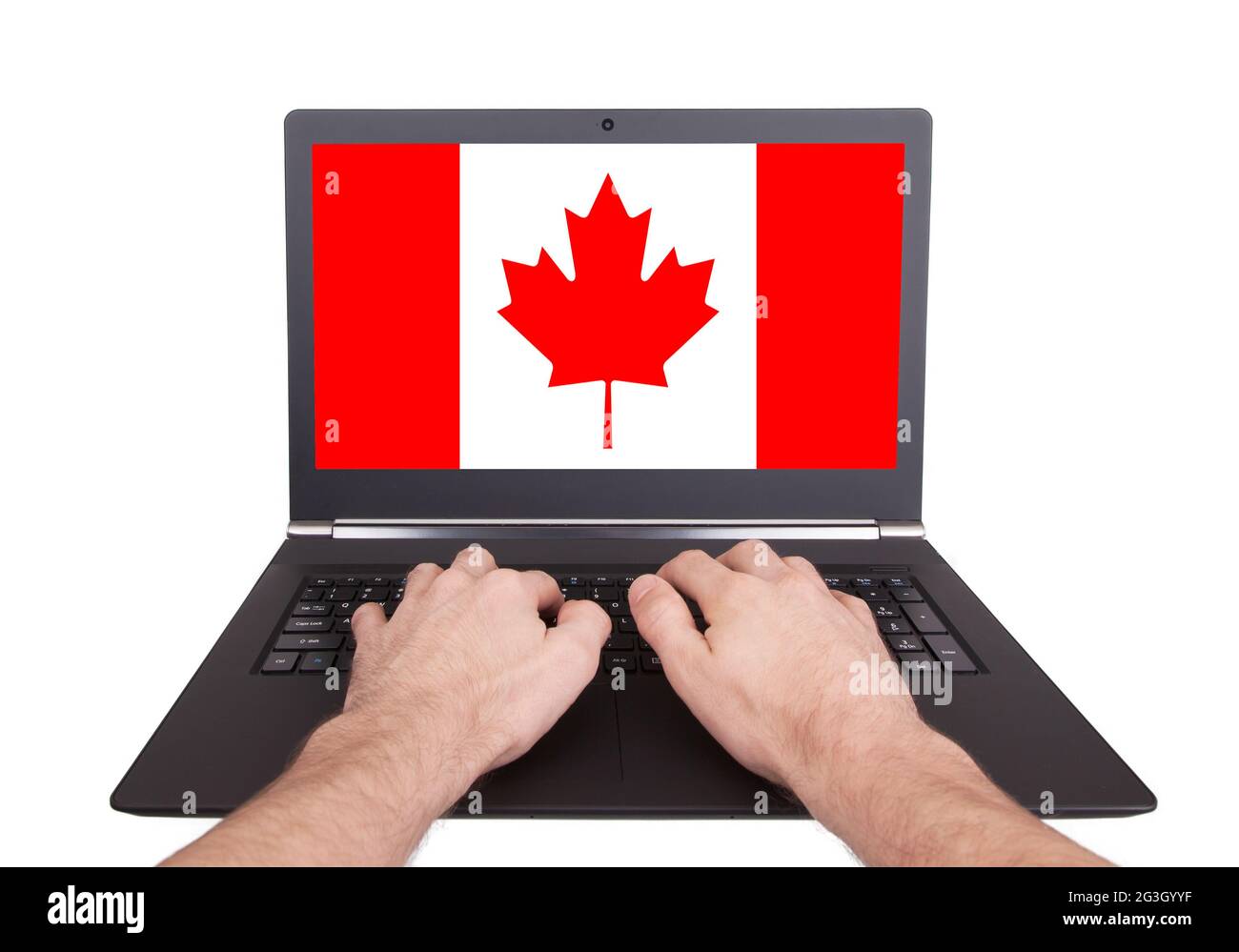 Mains travaillant sur ordinateur portable, Canada Photo Stock - Alamy