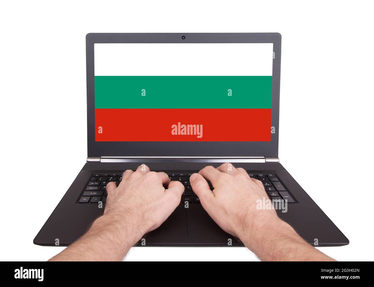 Mains travaillant sur ordinateur portable, Bulgarie Banque D'Images