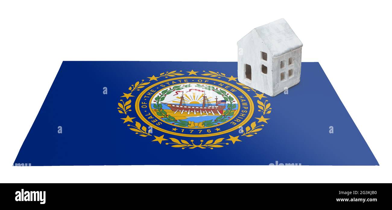 Petite maison sur un drapeau - New Hampshire Banque D'Images