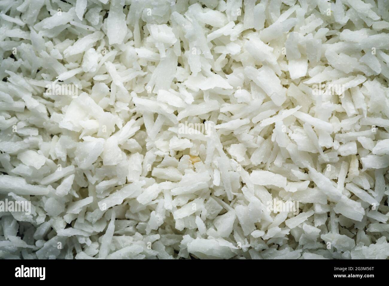 Flocons de noix de coco desséchée macro fond Banque D'Images