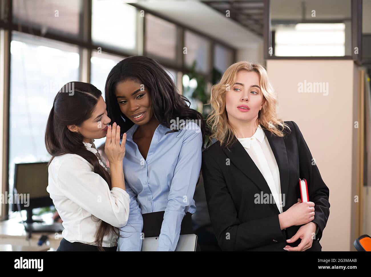 Trois femmes smiling doctors looking at the camera Banque D'Images