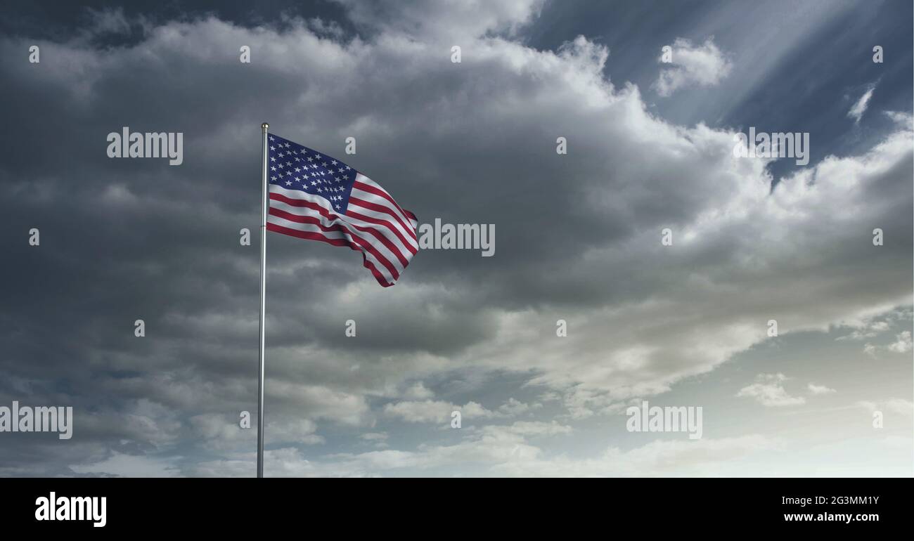 Composition du drapeau américain agité contre le ciel orageux Banque D'Images