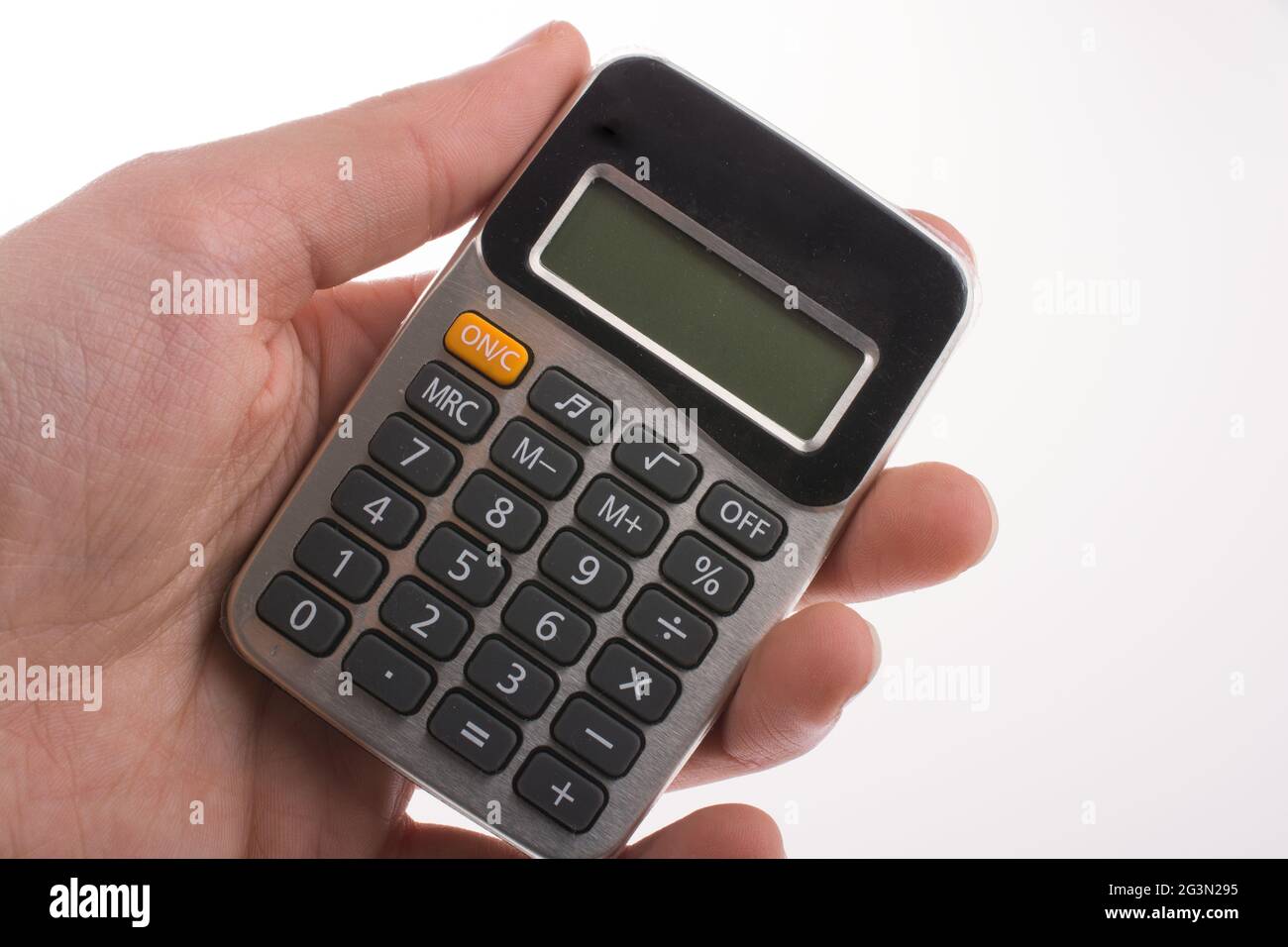 Calculatrice en main Banque D'Images