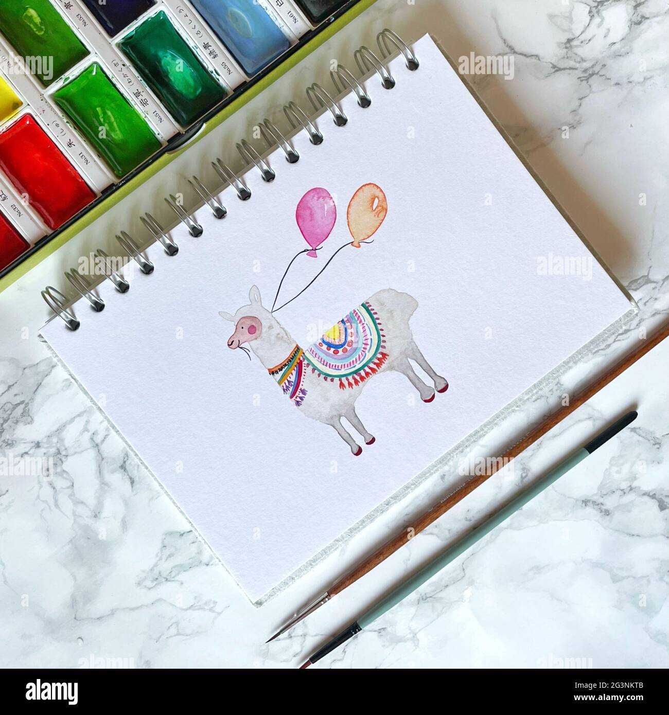 Peinture lama aquarelle dans le carnet d'esquisses Banque D'Images