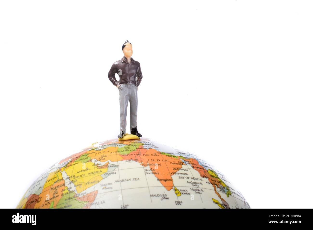 Homme sur le dessus du globe Banque D'Images