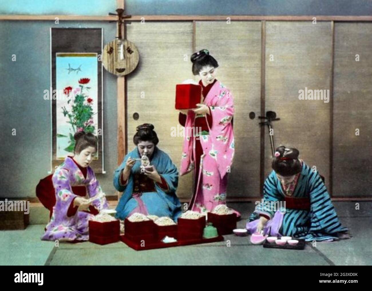 Adolfo Farsari photo japonaise ancienne - filles manger Banque D'Images