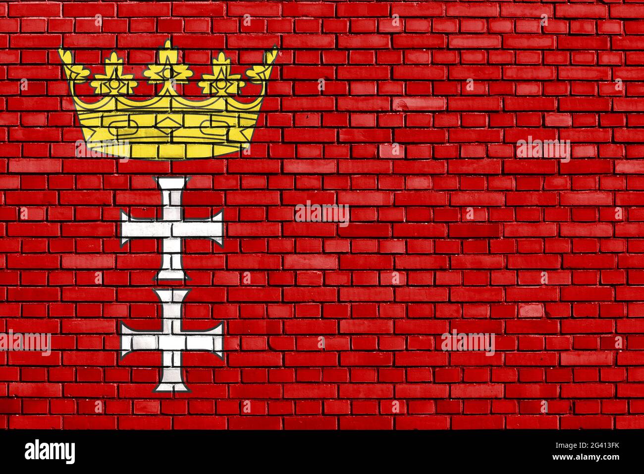 Drapeau de Gdansk peint sur un mur de briques Banque D'Images