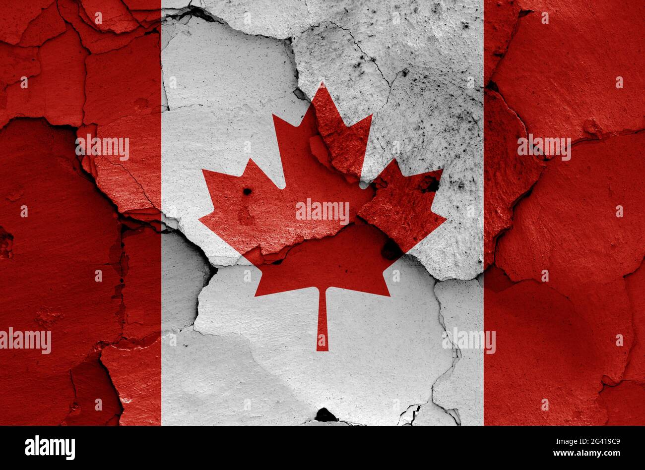 Drapeau du Canada peint sur un mur fissuré Banque D'Images