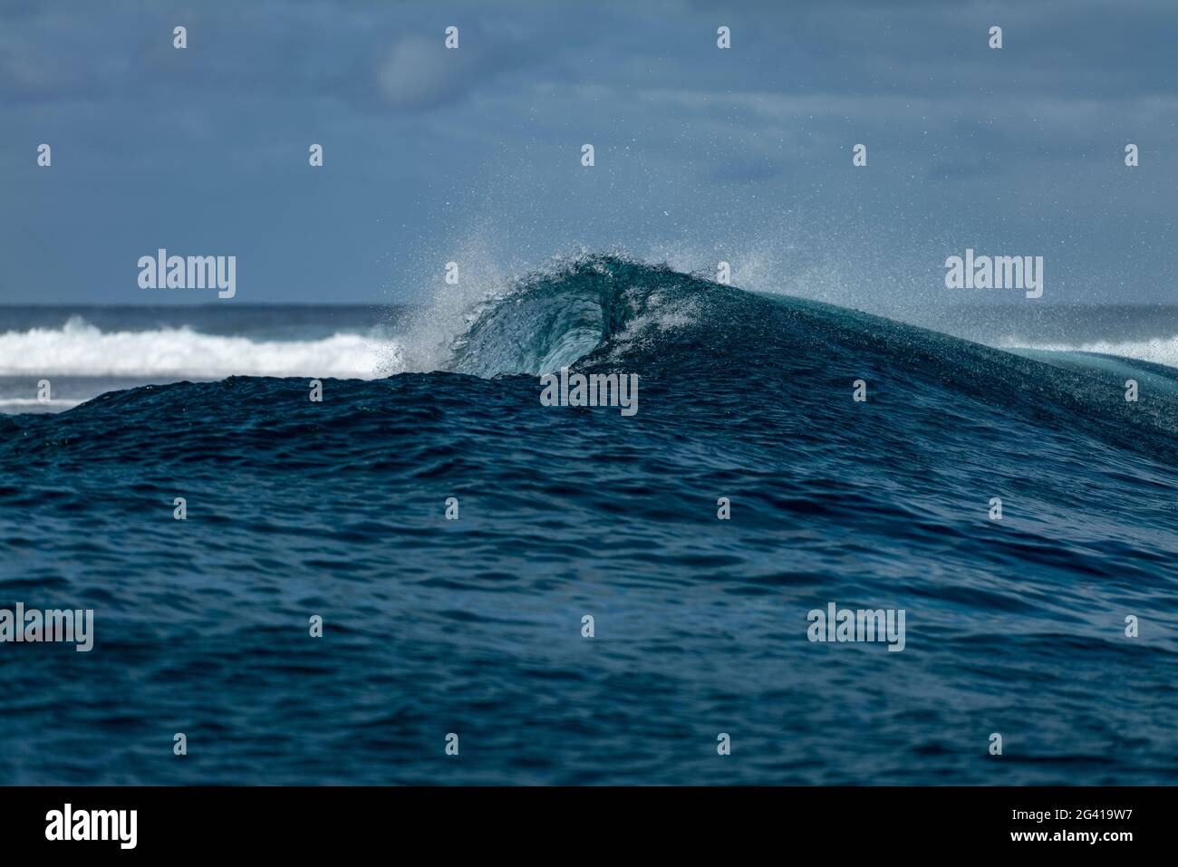 Vague de rupture dans la zone de surf Teahupoo, Tahiti Iti, Tahiti, les îles du vent, Polynésie française, Pacifique Sud Banque D'Images