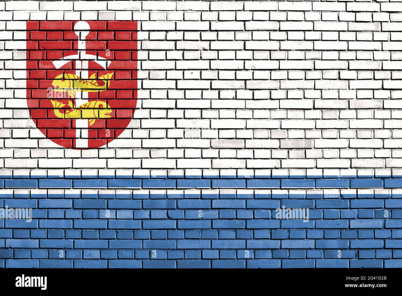 Drapeau de Gdynia peint sur un mur de briques Banque D'Images