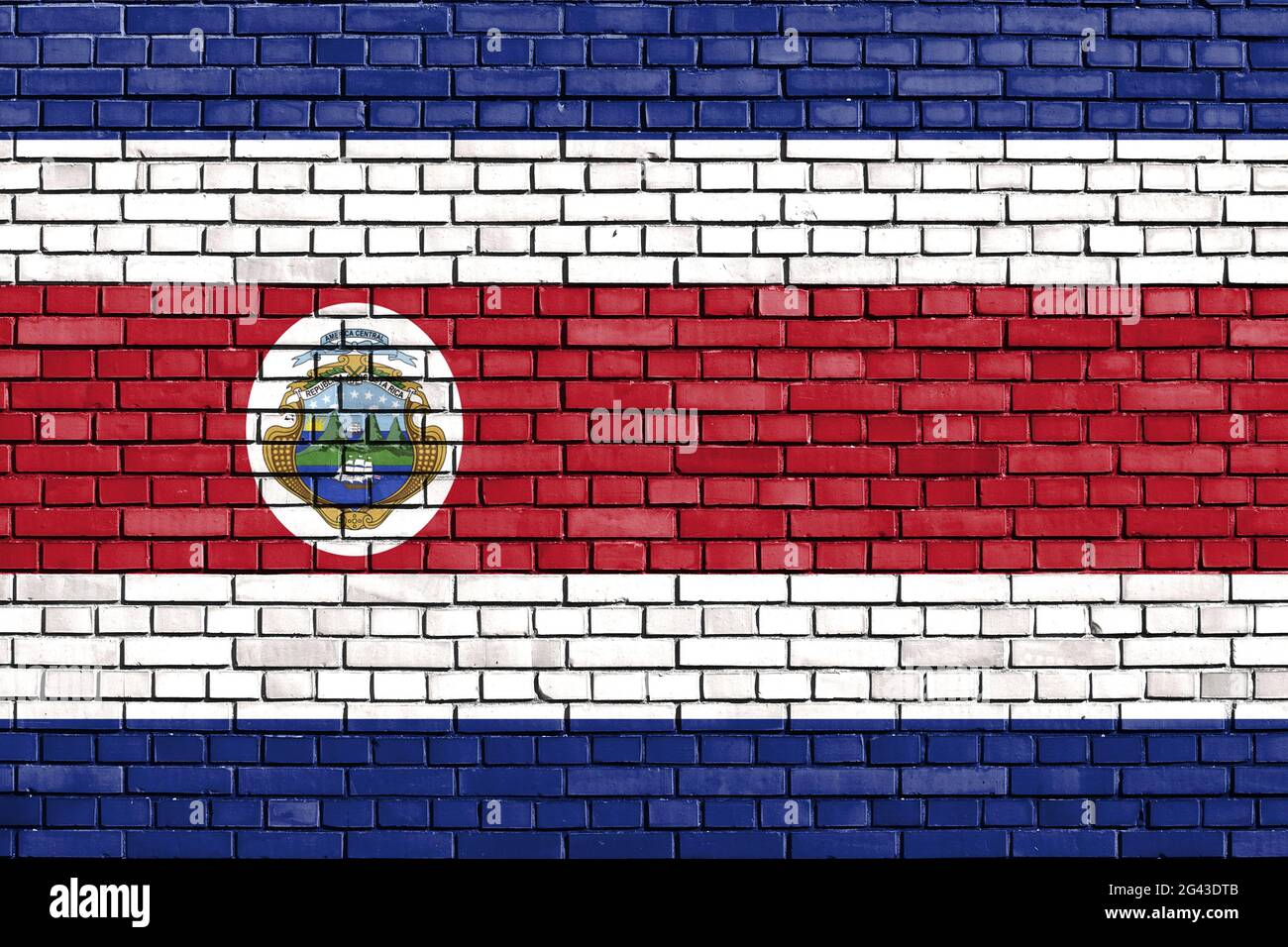 Drapeau du Costa Rica peint sur un mur de briques Banque D'Images