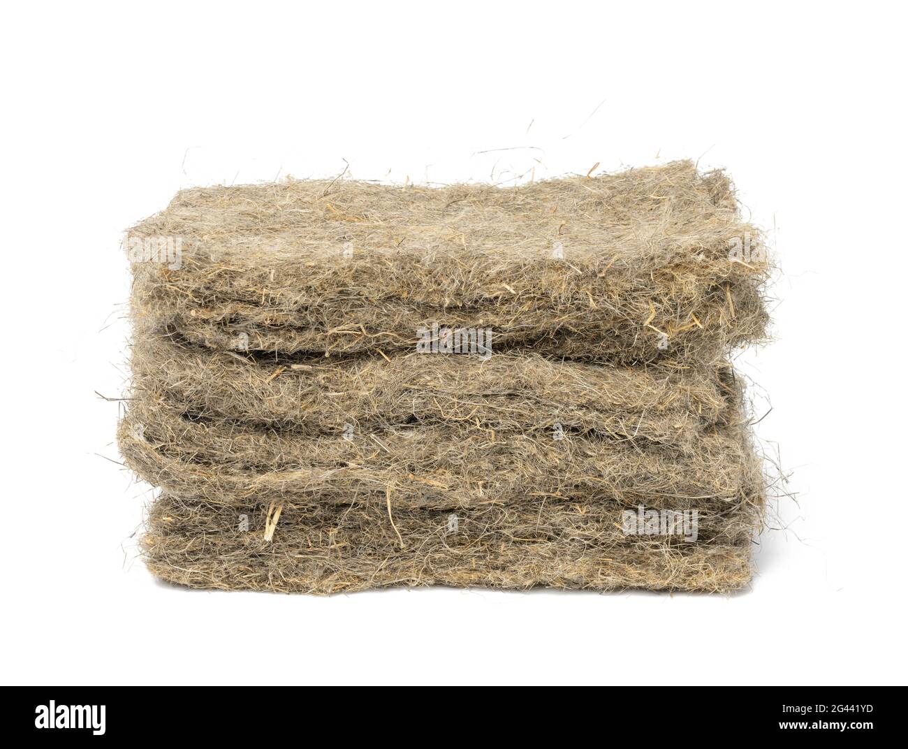 Pile de tapis de lin pour la culture de microverts isolés sur fond blanc Banque D'Images
