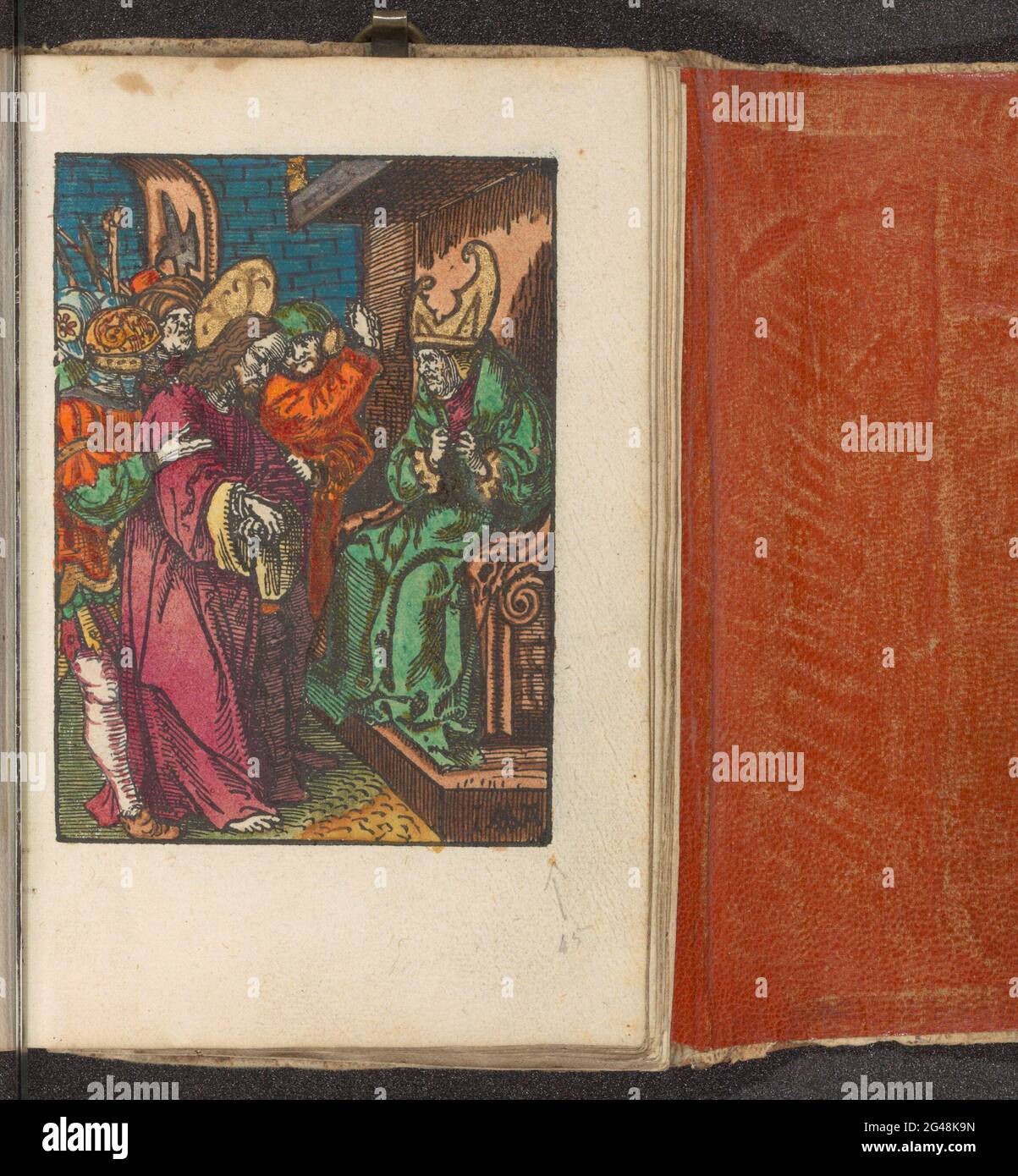 Christ pour Kajafas; la petite passion; la passion stupide. Le Christ est amené au souverain sacrificateur kajafas. Kajafas est assis sur un trône et est sur le point de déchirer son tapis avec les deux mains. L'impression fait partie d'un livre. Banque D'Images
