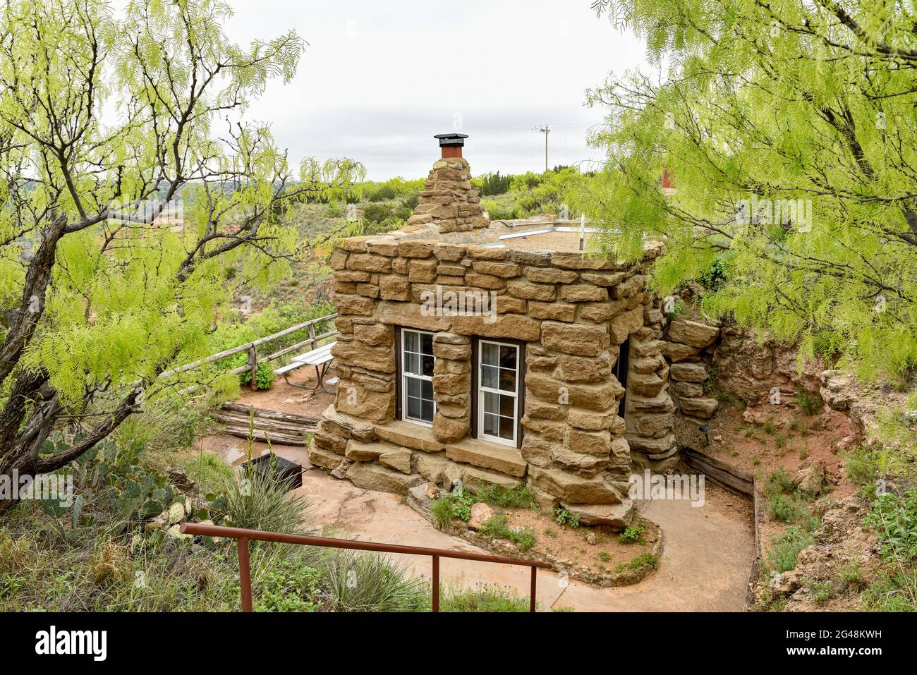 Chalet rustique Charles Goodnight au parc national de Palo Duro Canyon, Texas. Banque D'Images